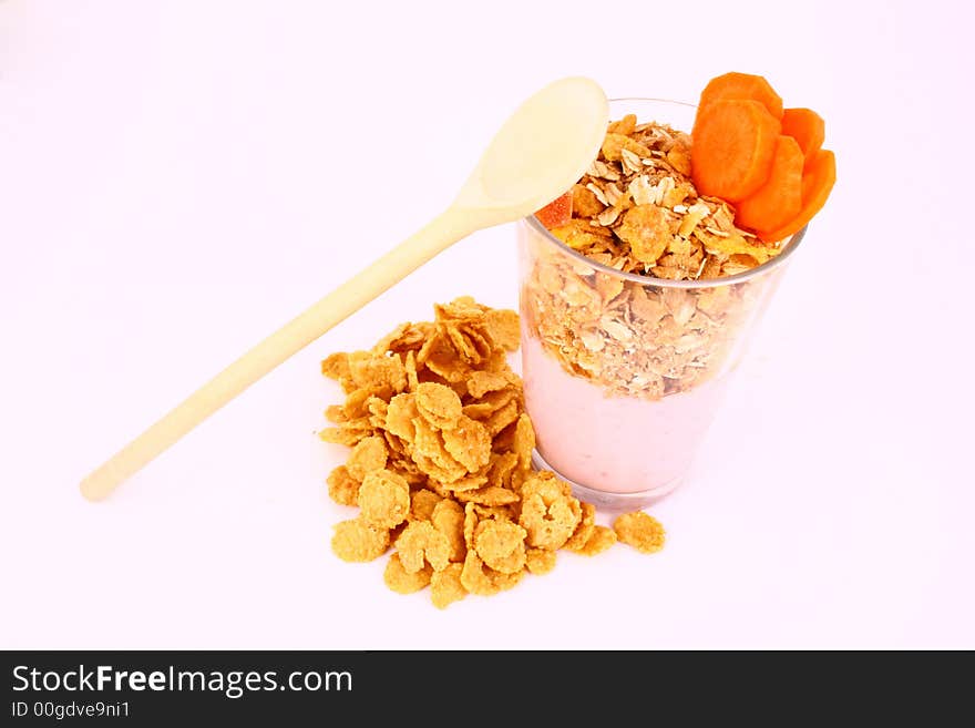 A bowl full of granola isolated on white background. A bowl full of granola isolated on white background