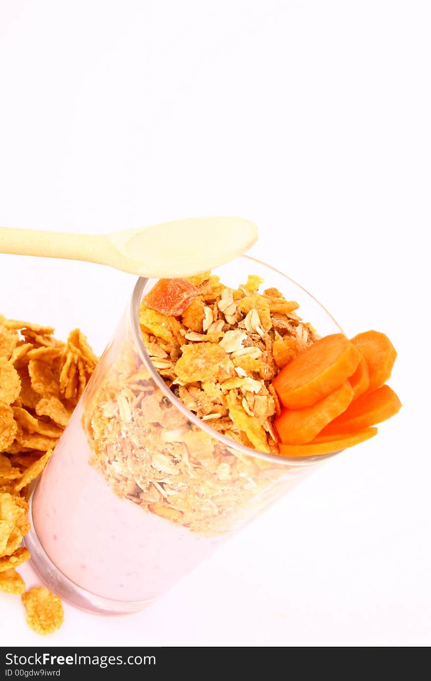 A bowl full of granola isolated on white background. A bowl full of granola isolated on white background