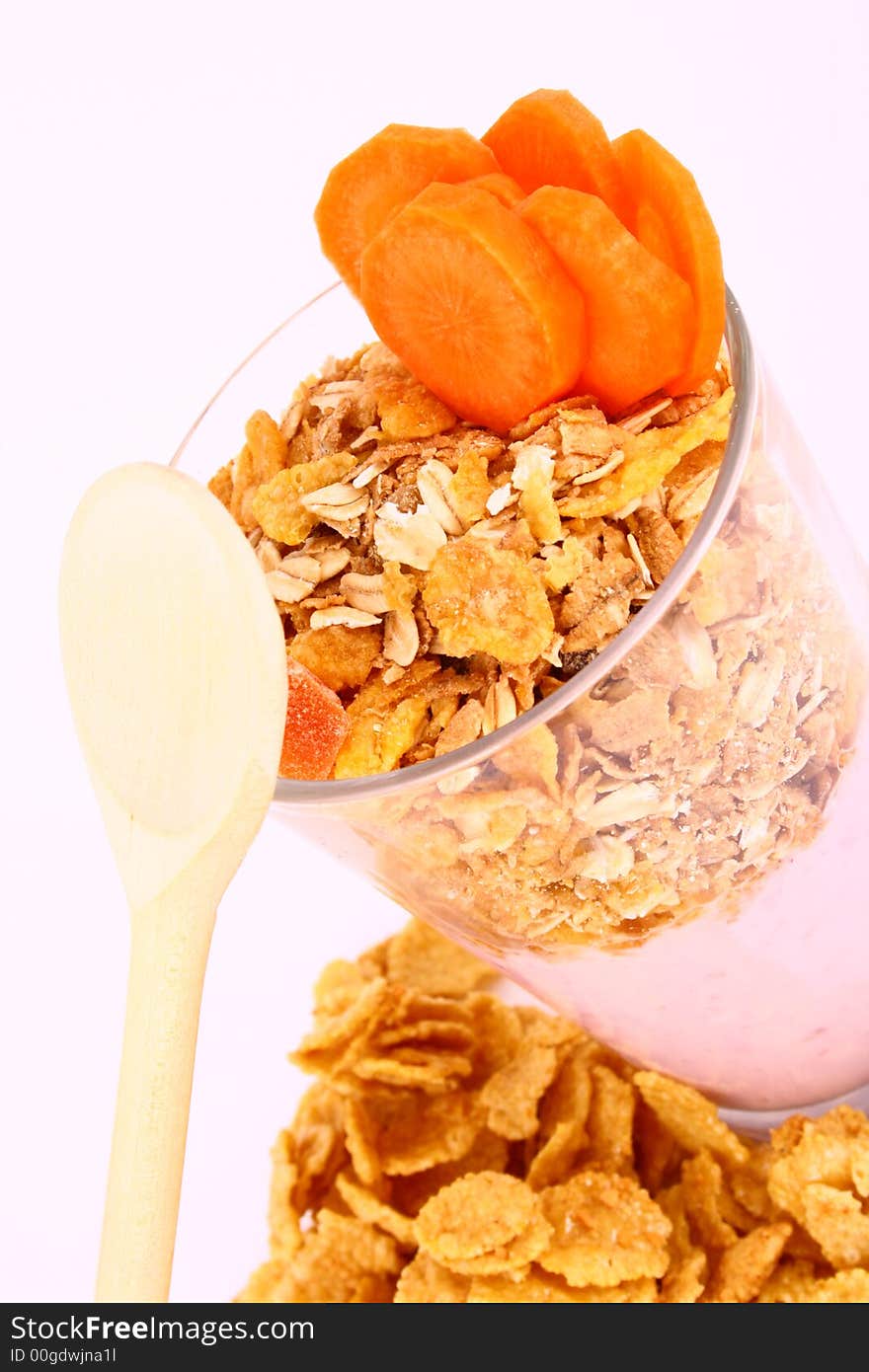 A bowl full of granola isolated on white background. A bowl full of granola isolated on white background