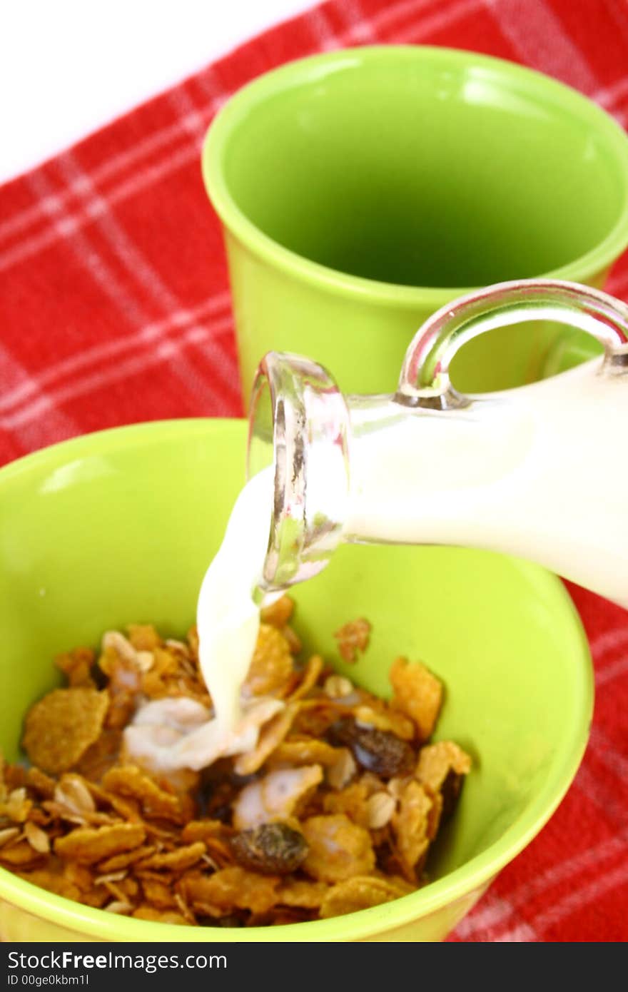 A bowl full of granola isolated on white background. A bowl full of granola isolated on white background