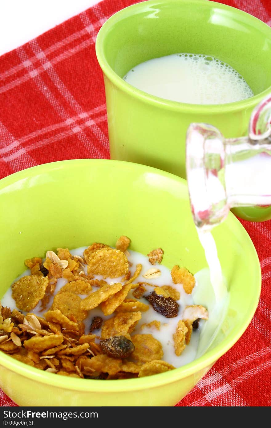 A bowl full of granola isolated on white background. A bowl full of granola isolated on white background