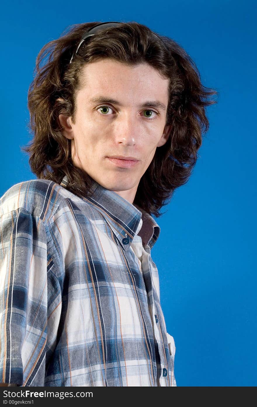 Young man portrait in blue sport shirt. Young man portrait in blue sport shirt