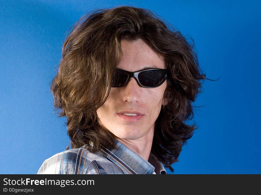 Long hair man with black sunglasses portrait. Long hair man with black sunglasses portrait