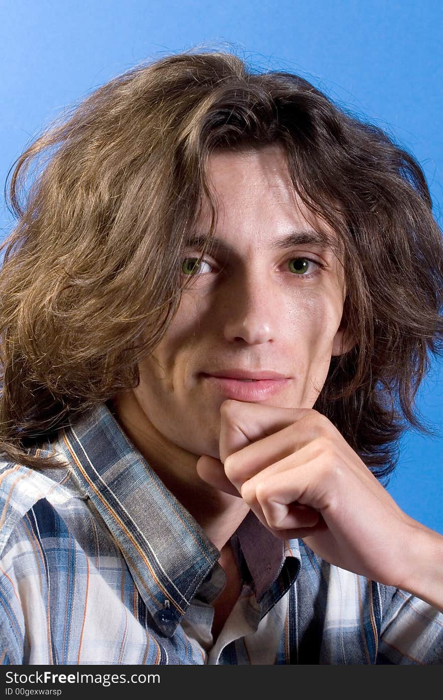 Young man portrait while resting his head