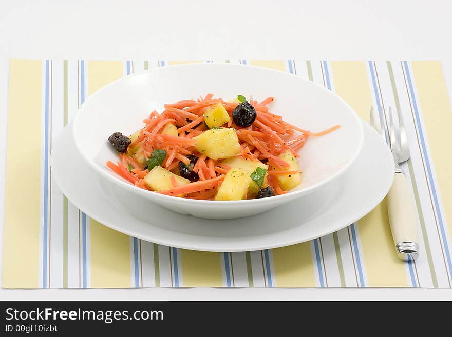 Shredded carrots, pineapple chunks, raisins mixed together for a refreshing salad or side dish. Shredded carrots, pineapple chunks, raisins mixed together for a refreshing salad or side dish.