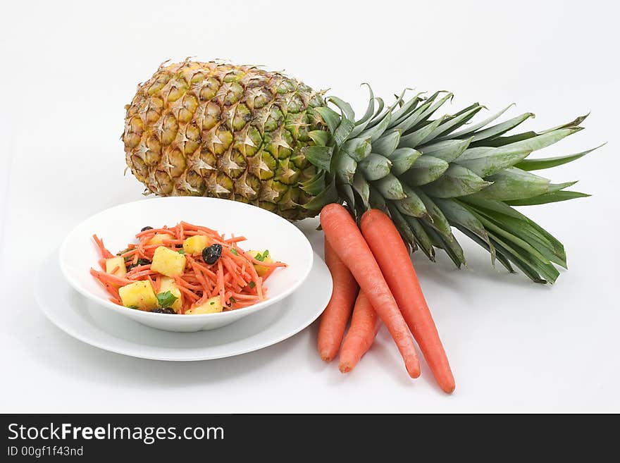 Shredded carrots, pineapple chunks, raisins mixed together for a refreshing salad or side dish. Shredded carrots, pineapple chunks, raisins mixed together for a refreshing salad or side dish.