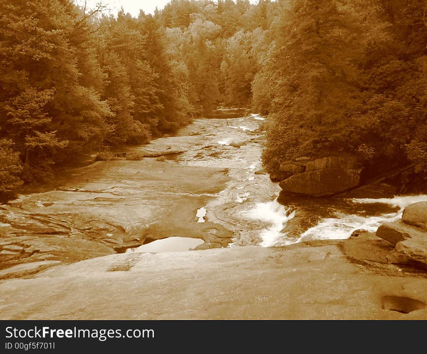 A waterfall in the Dupont State Forest of North Carolina. A waterfall in the Dupont State Forest of North Carolina.