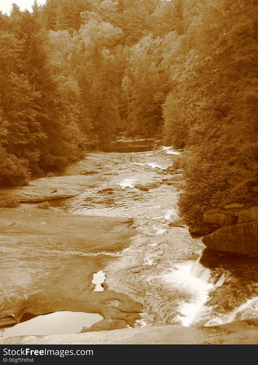 A waterfall in the Dupont State Forest of North Carolina. A waterfall in the Dupont State Forest of North Carolina.