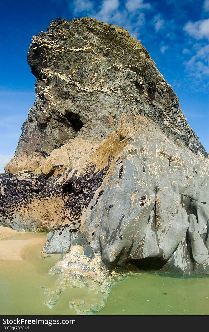 One of the rocks of bedruthin steps,
near newquay,
cornwall,
united kingdom. One of the rocks of bedruthin steps,
near newquay,
cornwall,
united kingdom.