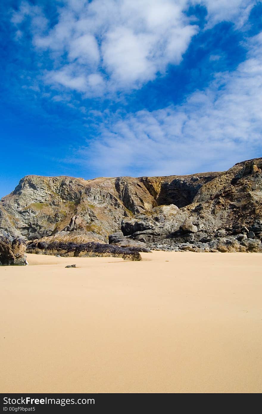 Sand,cliffs and clouds