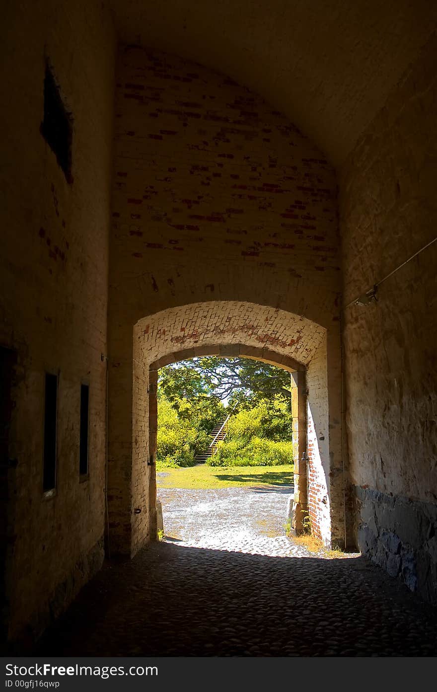 A darl alley leading to courtyard. A darl alley leading to courtyard