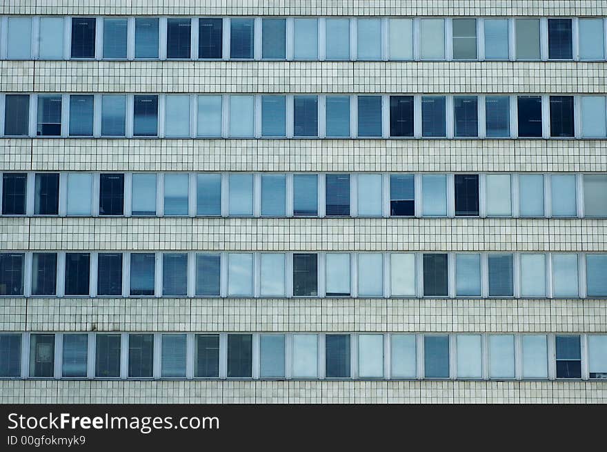 A generic office building with many windows