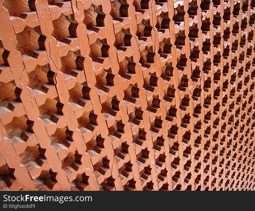 Futuristic brownish wood hole grid. Futuristic brownish wood hole grid