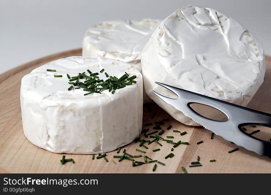 Arrangement with cheese and knife. Arrangement with cheese and knife