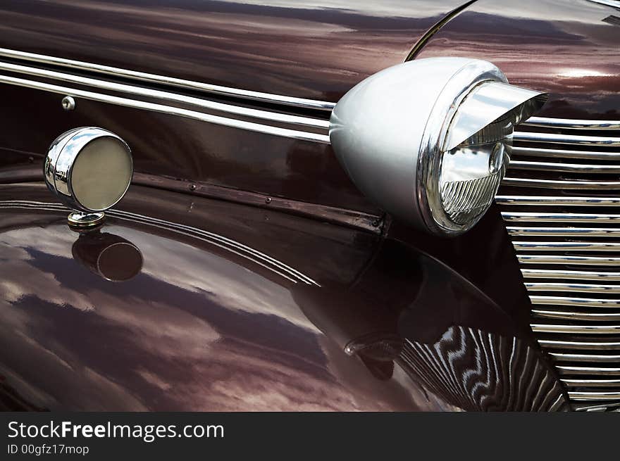 Reflection of the sky in the old car