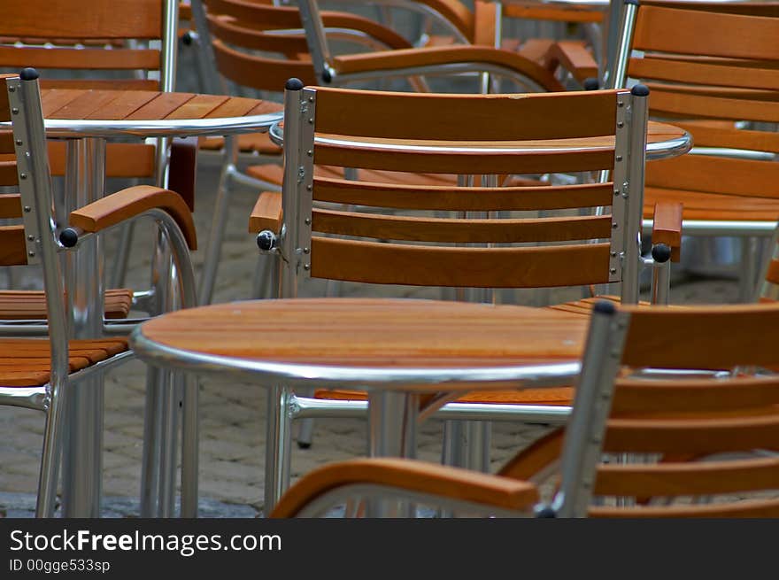 Chairs and tables in an outdoor cafe