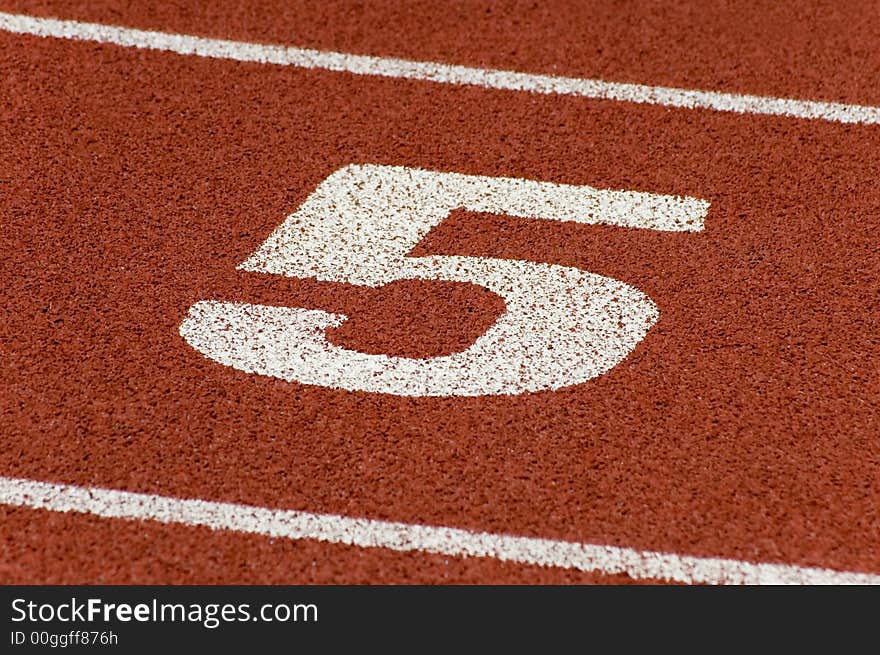 Marks on the surface of a running track