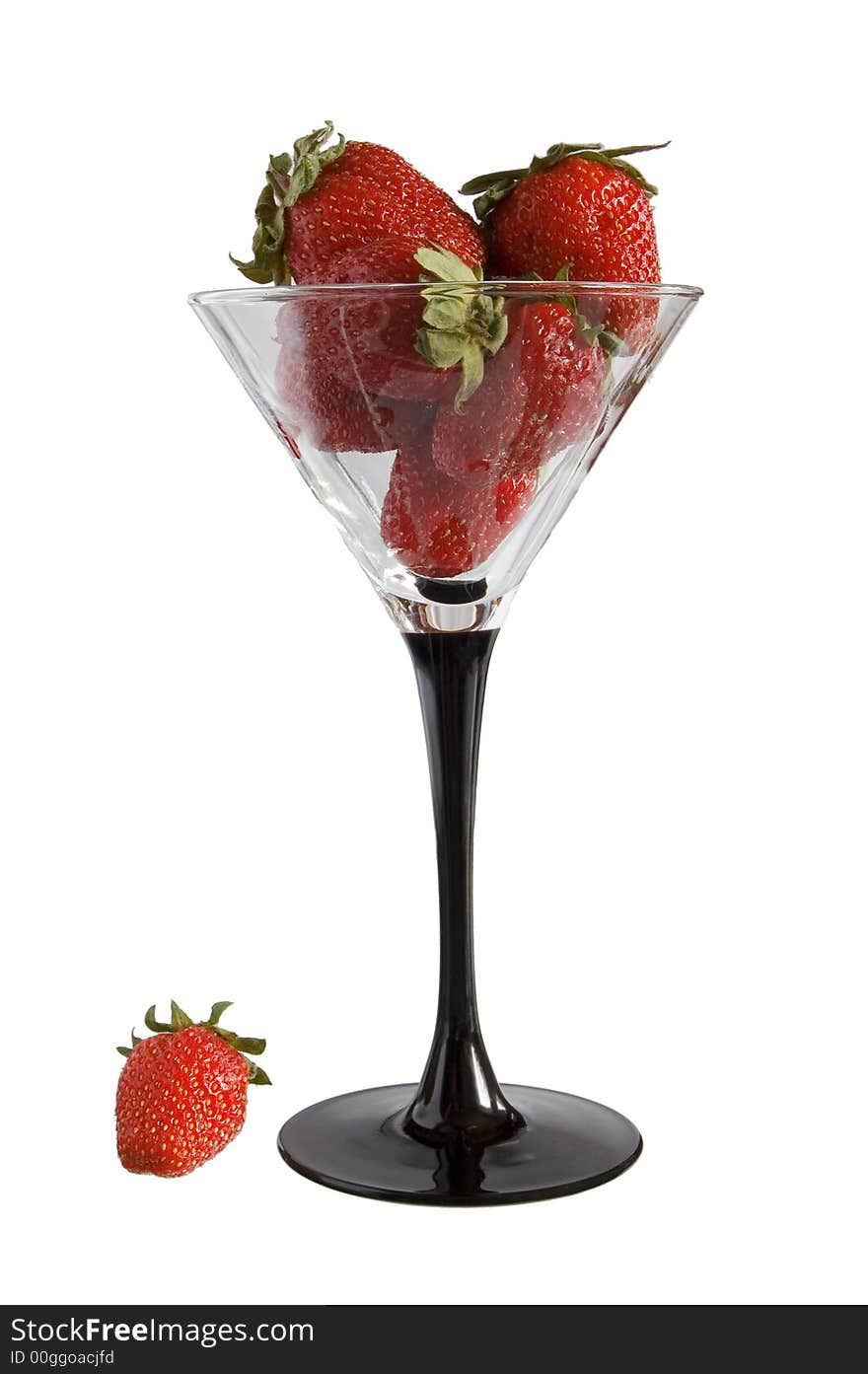 Strawberries in goblet on white