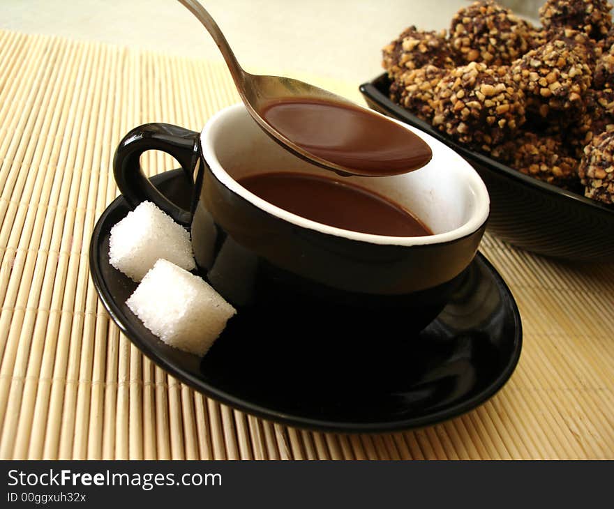 Cup of chocolate with fresh-baked cookies