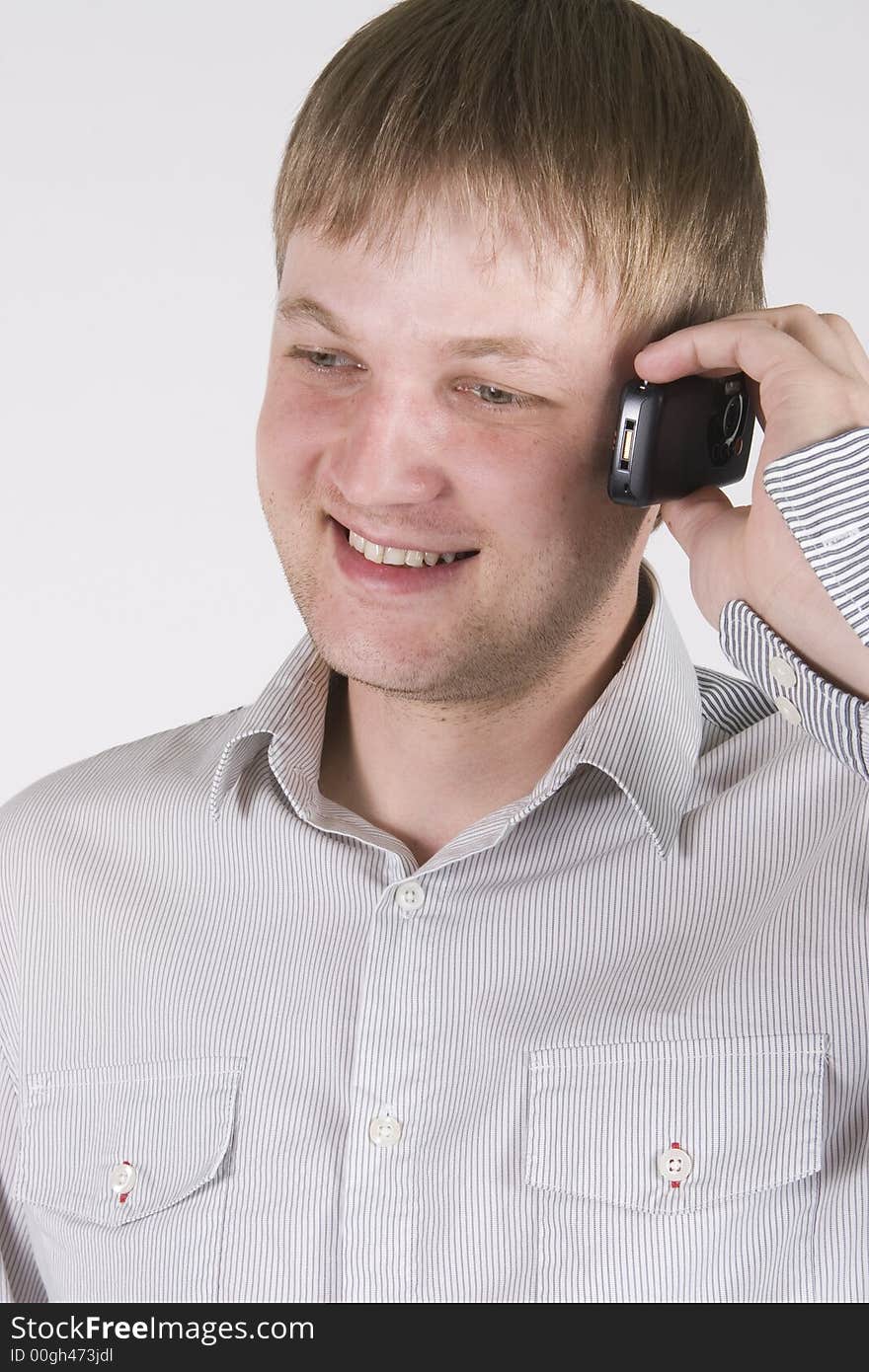 Young man talking on the phone. Young man talking on the phone