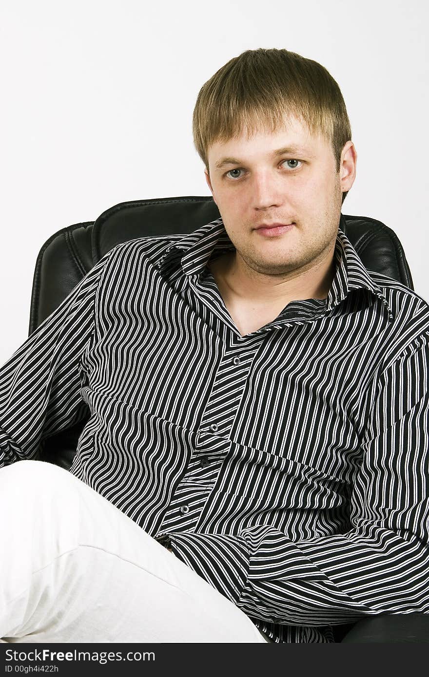 Young businessman sitting on the chair