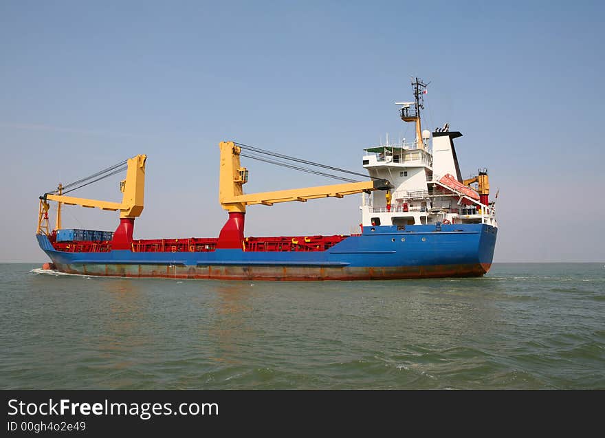 Feeder on his way to port-pilot on board. Feeder on his way to port-pilot on board