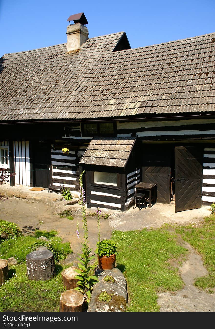 Wooden village house as an example of traditional czech architecture.