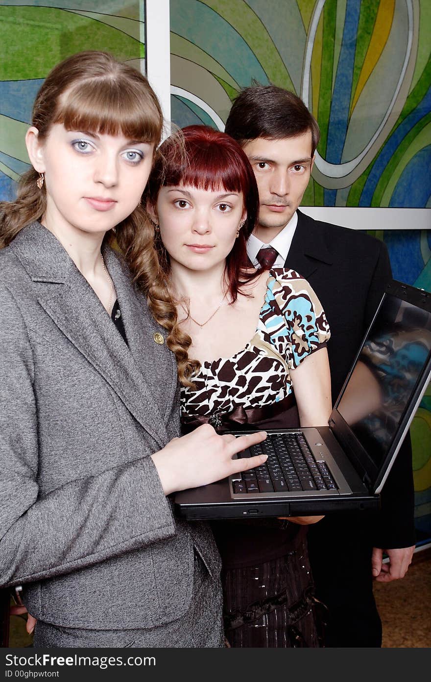 Group of business people working together in the office. Group of business people working together in the office.