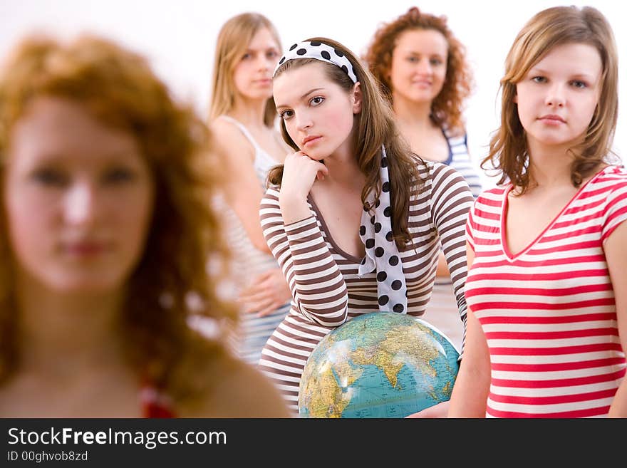 Five attractive young girls in summerclothes ready for their holiday trip. Five attractive young girls in summerclothes ready for their holiday trip