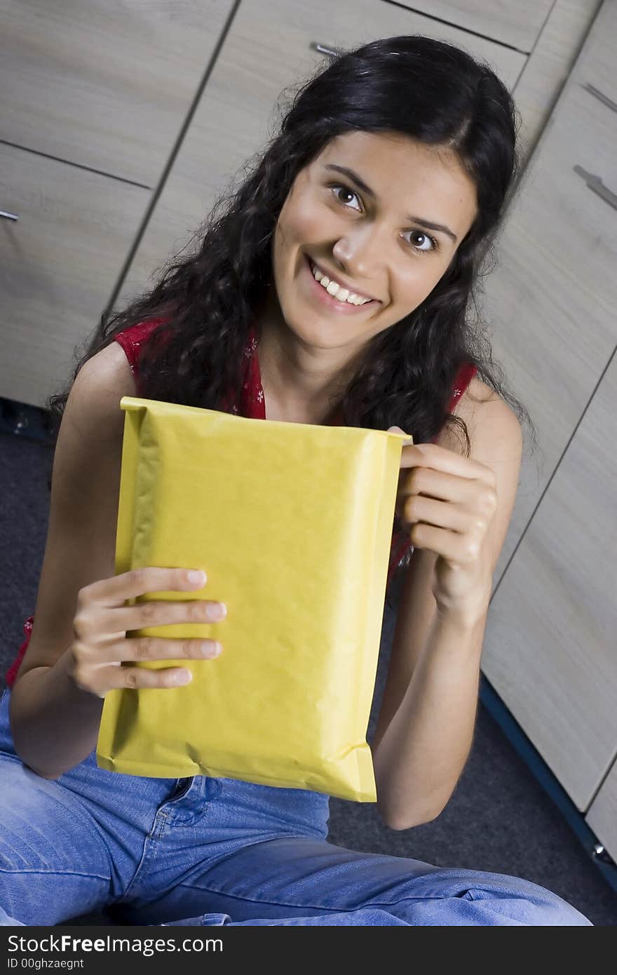 Girl with envelope in her hands. Girl with envelope in her hands