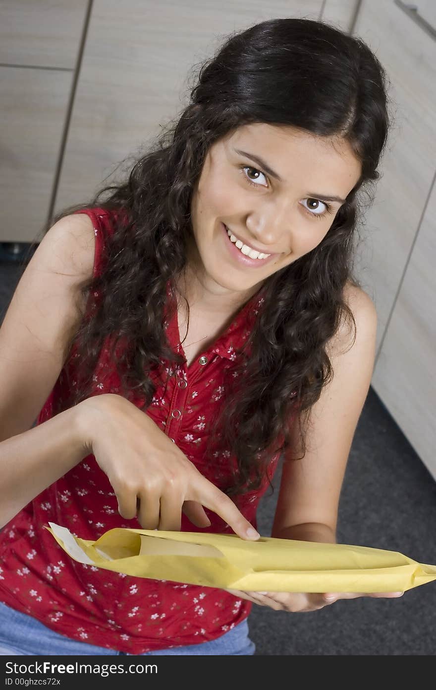 Girl with envelope in her hands. Girl with envelope in her hands