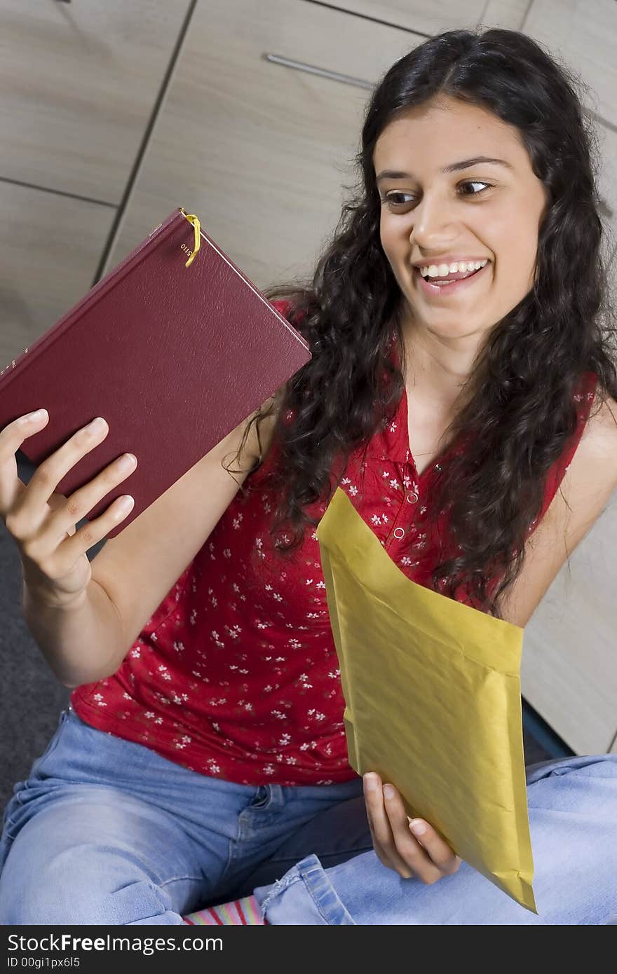 Girl with envelope in her hands. Girl with envelope in her hands