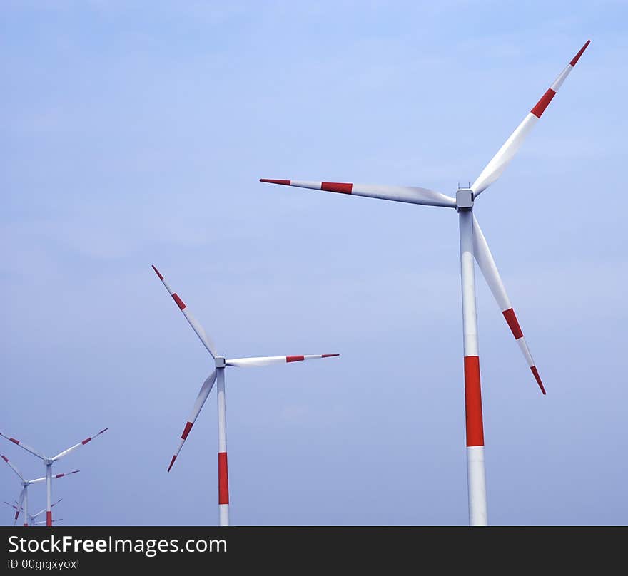 Wind turbines with cloudy background