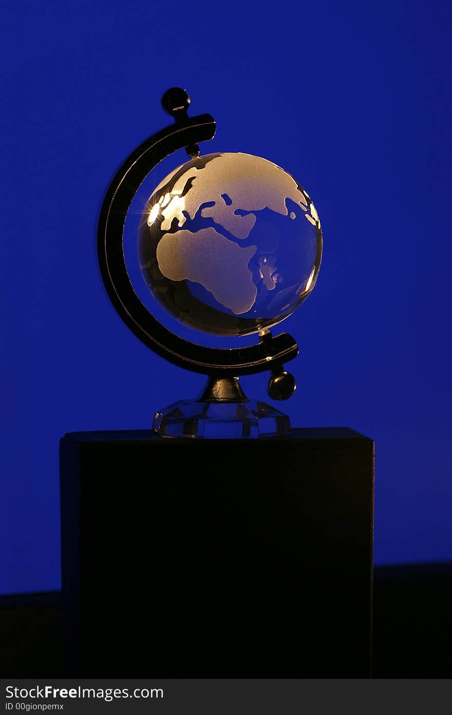 Glass globe on a blue background