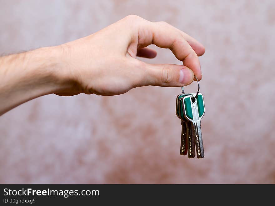 Keys in the mens hand. Keys in the mens hand