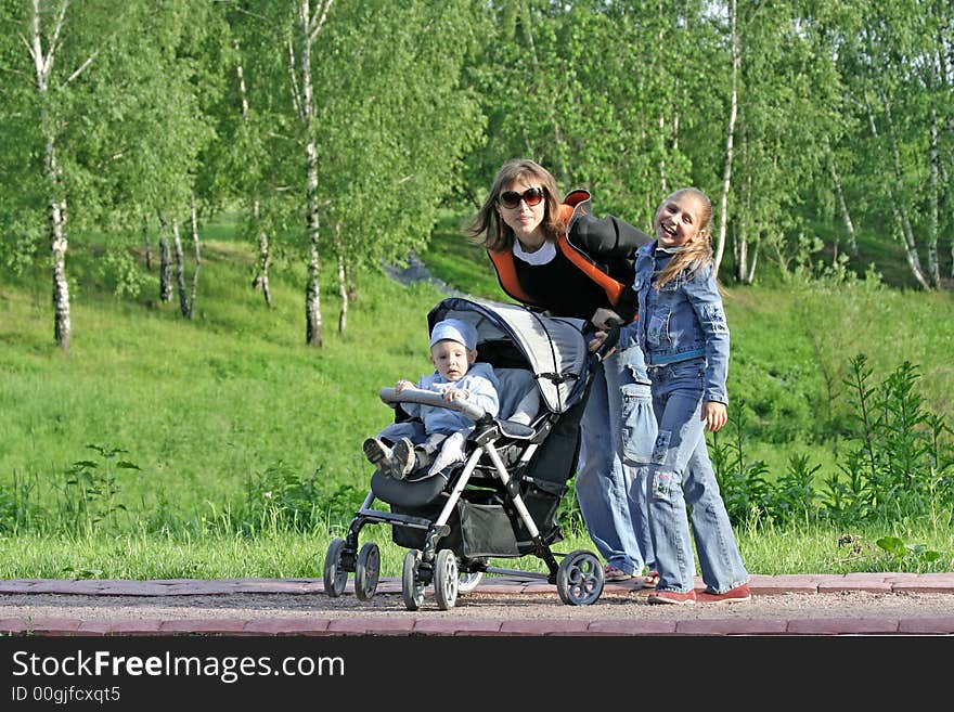 Mother with children on walk