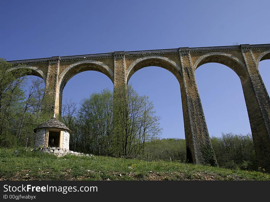 Large arch bridge on blue sky. Large arch bridge on blue sky