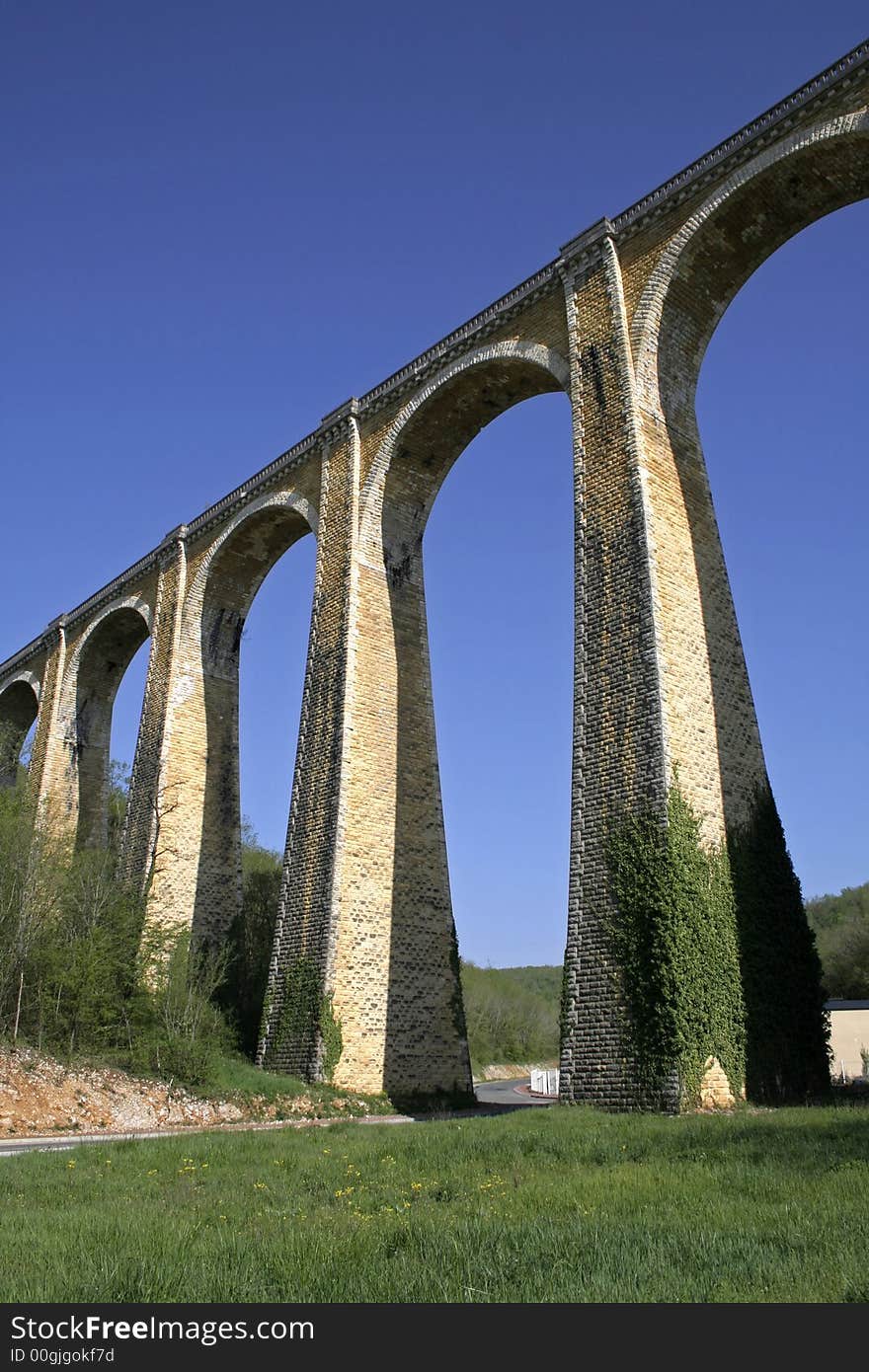 Large arch bridge on blue sky