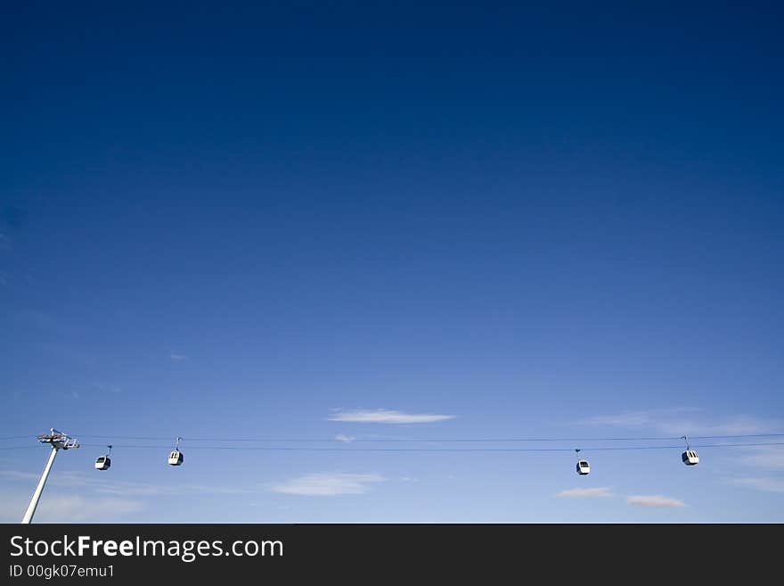 Blue sky minimalistic view of cablecars in Lisbon