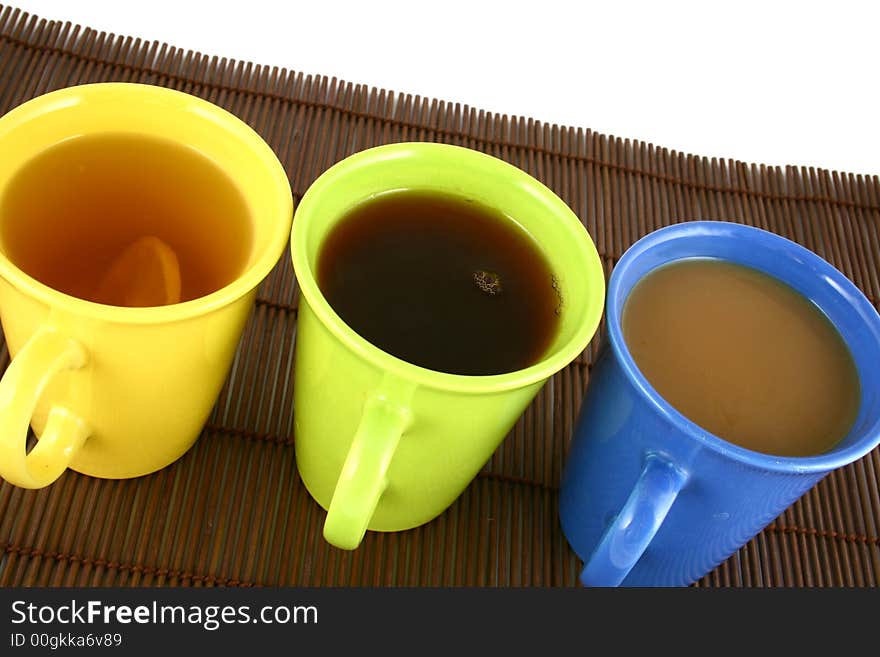 A beautiful cup on white background with coffee and tea. A beautiful cup on white background with coffee and tea