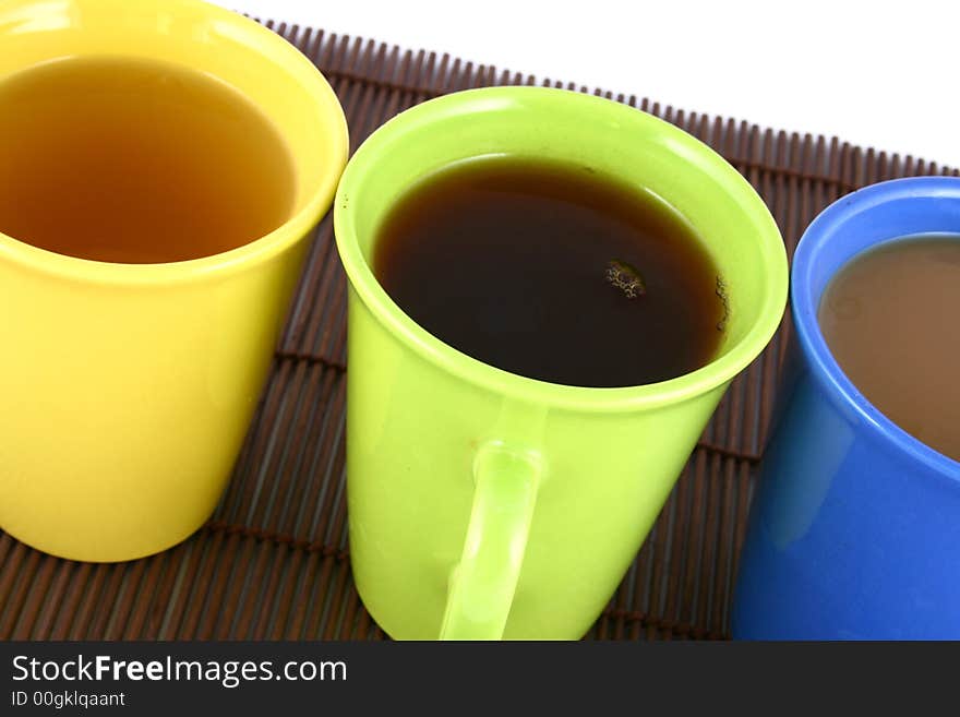 A beautiful cup on white background with coffee and tea. A beautiful cup on white background with coffee and tea