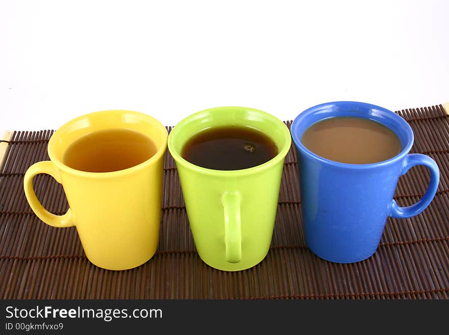 A beautiful cup on white background with coffee and tea. A beautiful cup on white background with coffee and tea