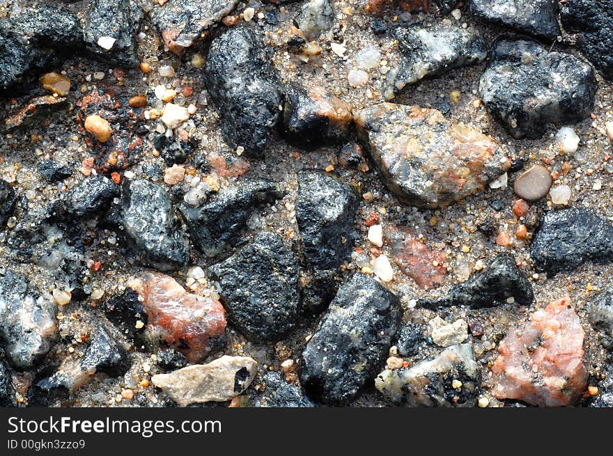 Texture of the road with stones