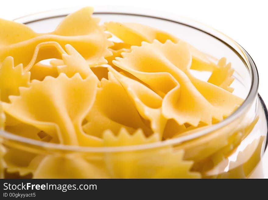 Close up view of the farfalle in glass can. Close up view of the farfalle in glass can