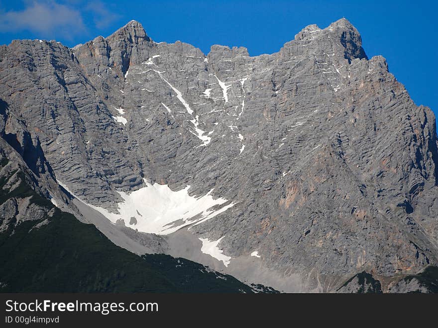 Mountain stone cup with the snow and sky