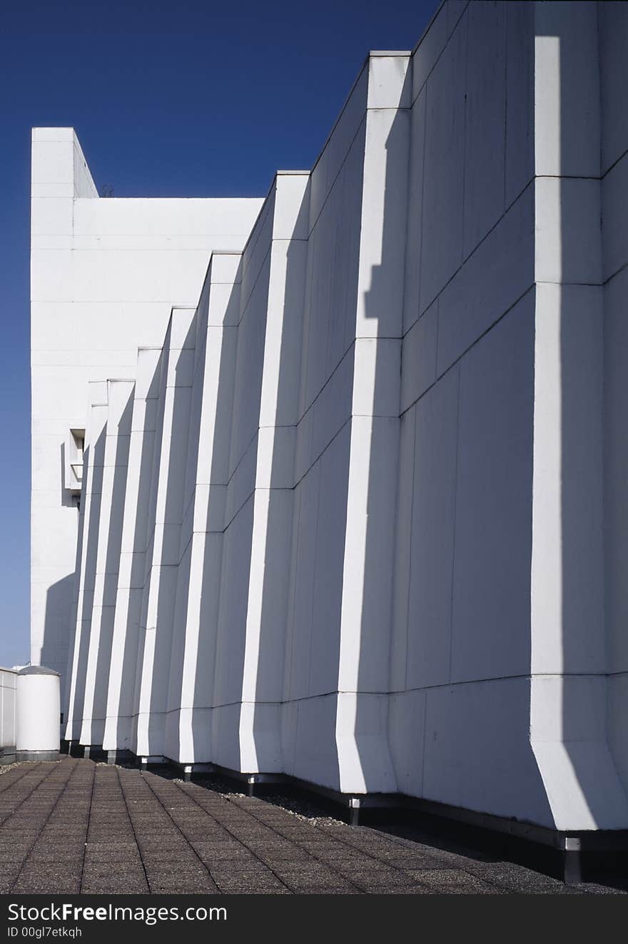 Peculiar graphical detail of a white building. Peculiar graphical detail of a white building