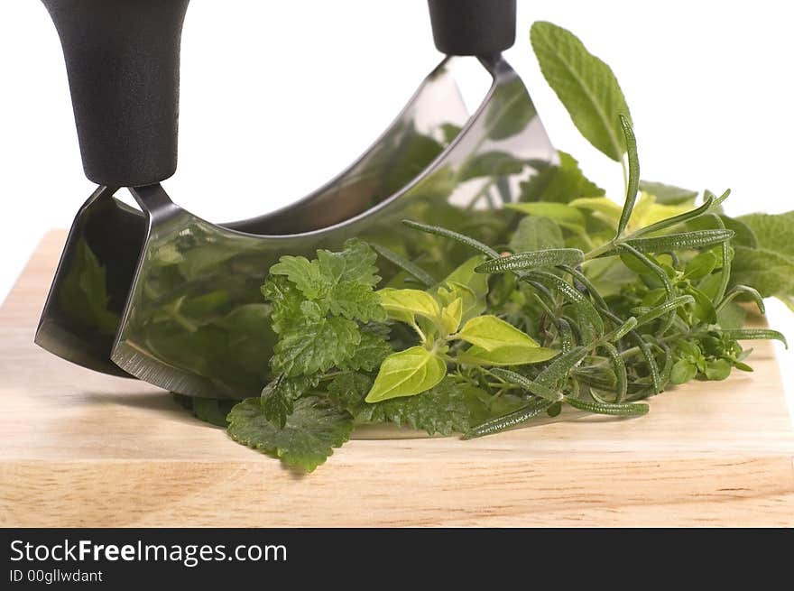 Chopping fresh herbs.