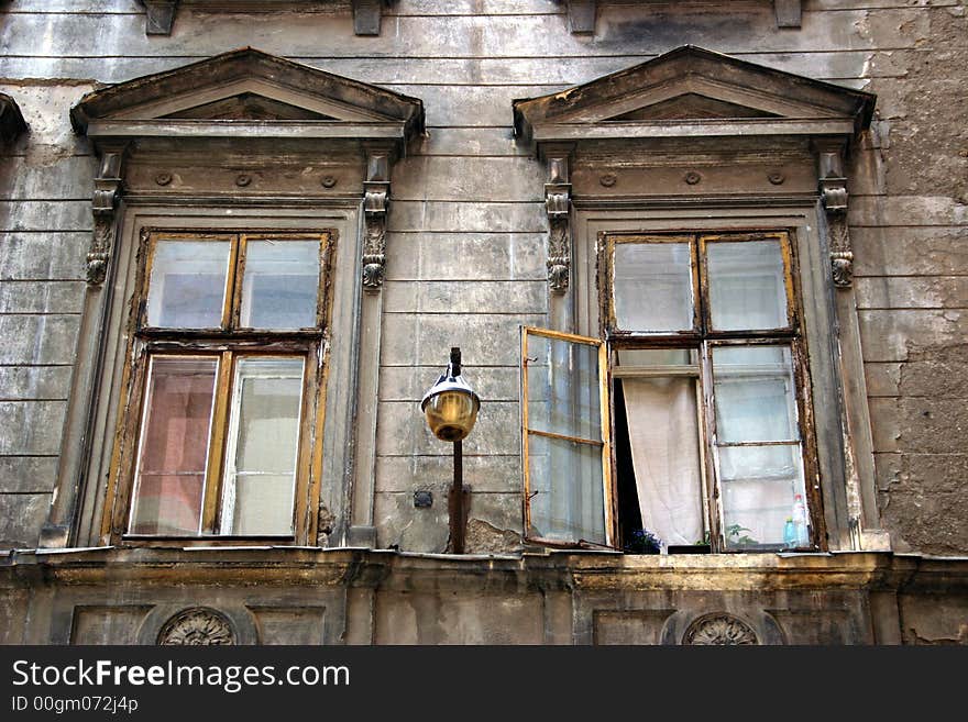 front face of old city house with latern. front face of old city house with latern