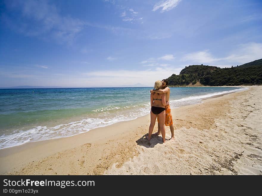 Young people on seacoast, beach