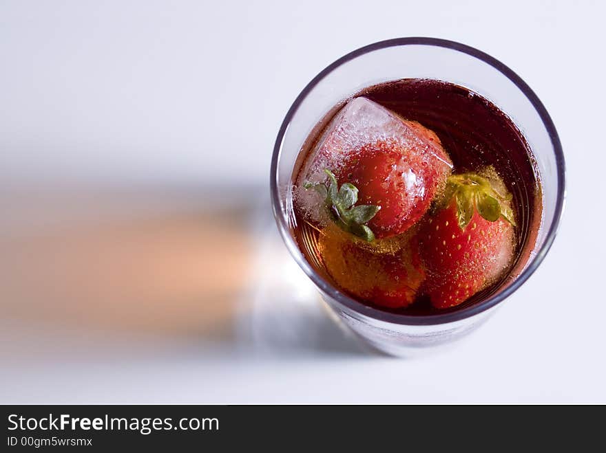 Strawberry drink with ice cubes. Strawberry drink with ice cubes